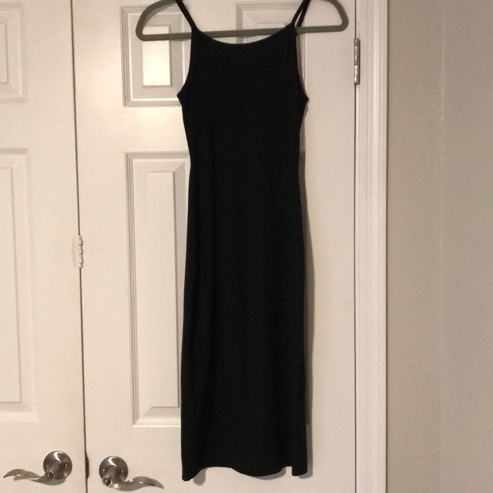 Skinny knee-length tight black dress